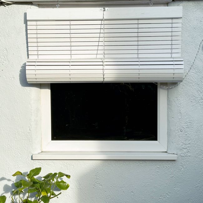 White outdoor wooden blind