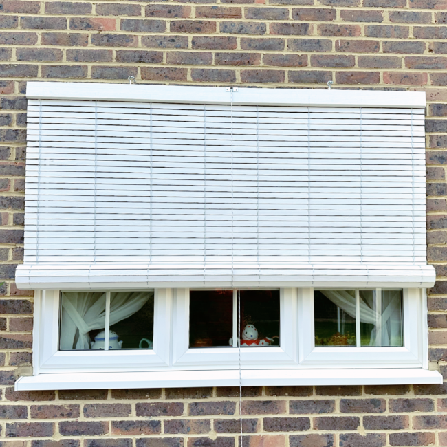 White outdoor wooden blind on brick W1800 x H1500 mm